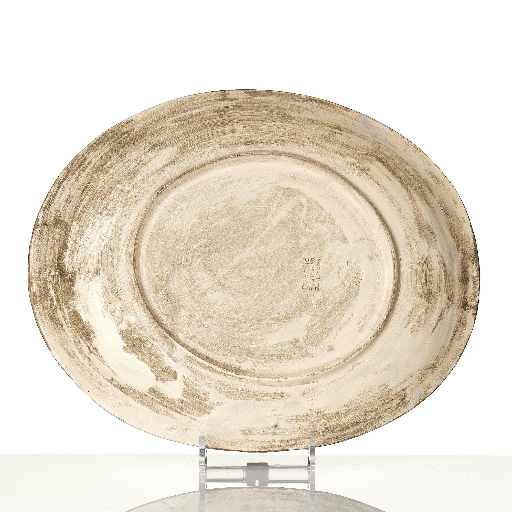 Pablo Picasso, a "Poisson" (see A.R. 166-171) faience dish, Madoura, Vallauris, France, post 1952.