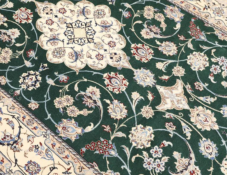 A part silk Nain rug, so-called 9LAA, approx. 257 x 161 cm.