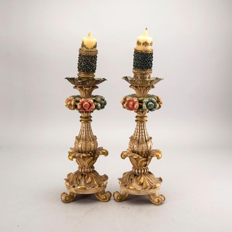 A pair mid 20th century wood candle sticks from Paoletti, Firenze Italy.