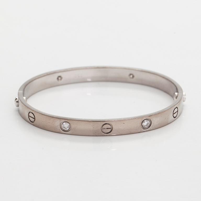 Cartier, rannekoru "Love", 18K valkokultaa, briljanttihiottuja timantteja.