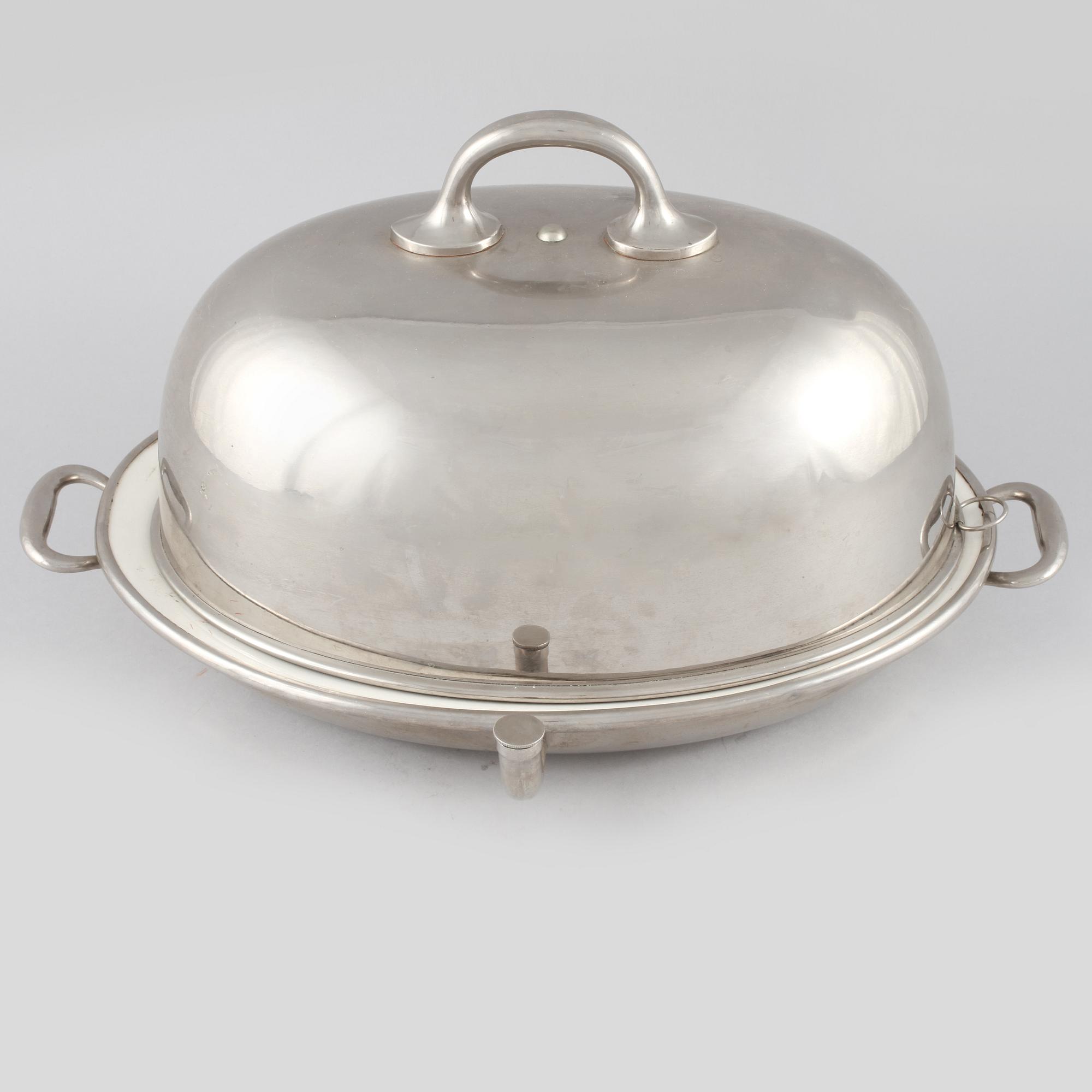 STEKHUV med VÄRMEFAT, metall och flintgods, 1900-talets första hälft.