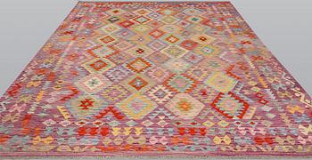 A kilim carpet, ca 345 x 246 cm.