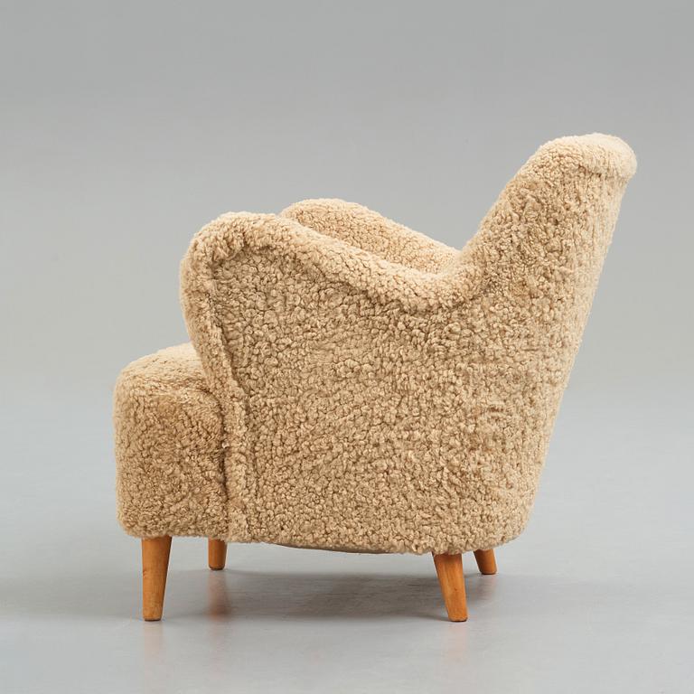 Gustav Axel Berg, a Swedish Modern easy chair for AB G.A. Bergs, 1940's.