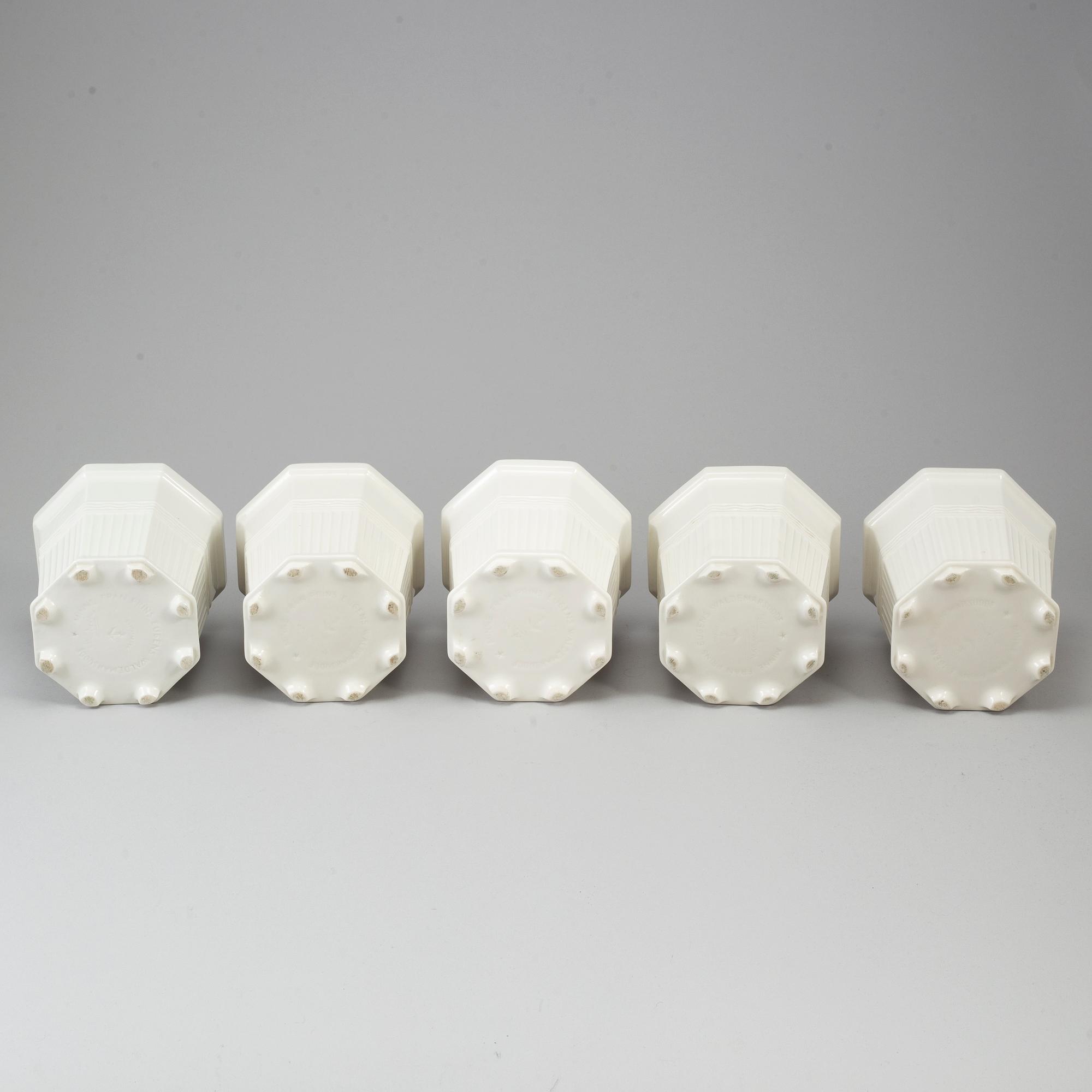 Five porcelain flowerpots by Prins Eugen.