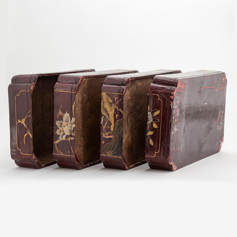 A painted Japanese four tiered box, 20th Century.