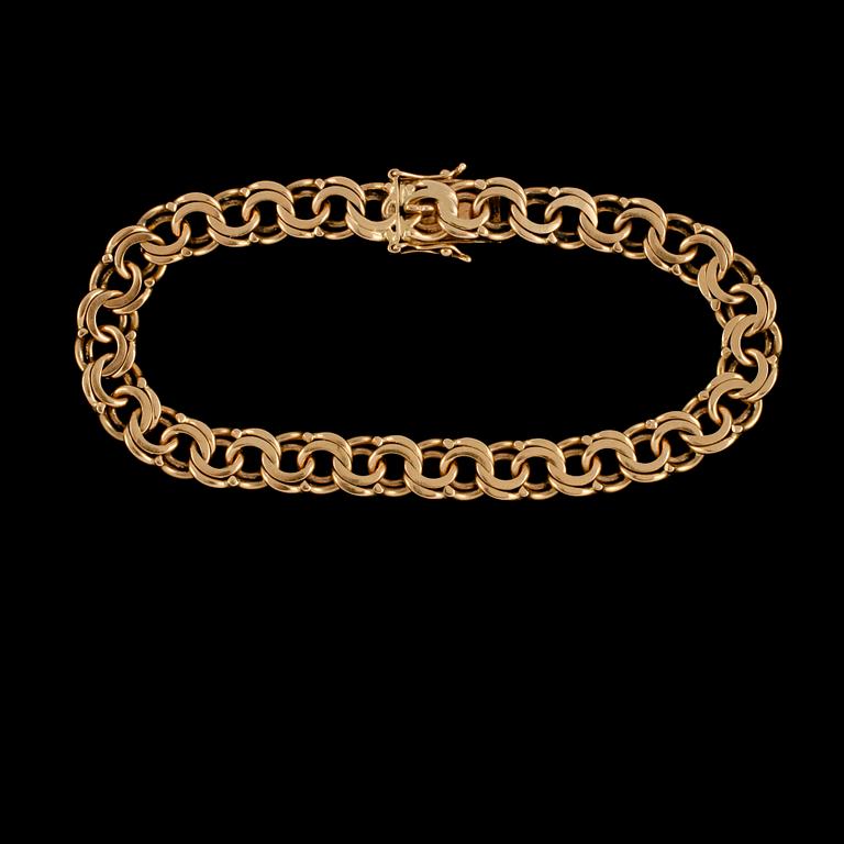 ARMLÄNK, 18k guld, G Kaplan, Stockholm, 1964. Vikt 25 g.