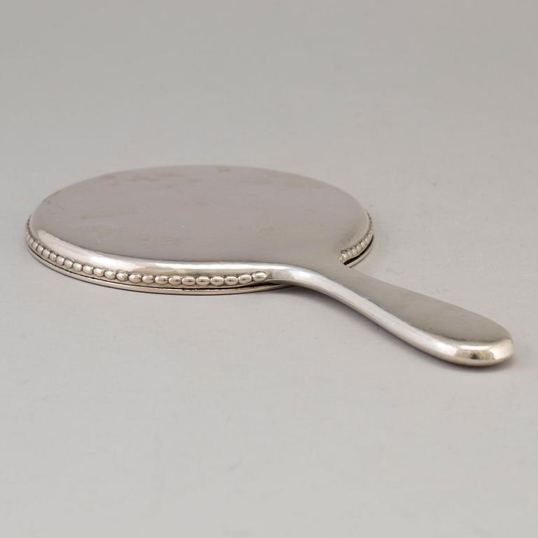 A Swedish silver hand mirror, maker's mark K. Anderson, Stockholm 1919.