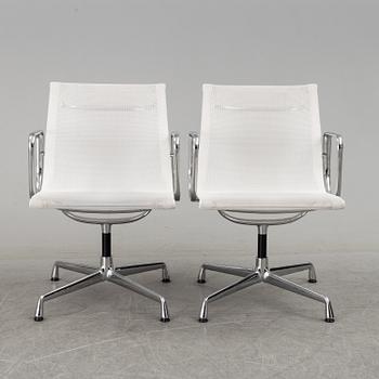 A pair of 'EA 108' desk chairs by Charles & Ray Eames for Vitra.