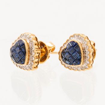 A pair of 18K gold earrings set with round brilliant-cut diamonds and square-cut sapphires.