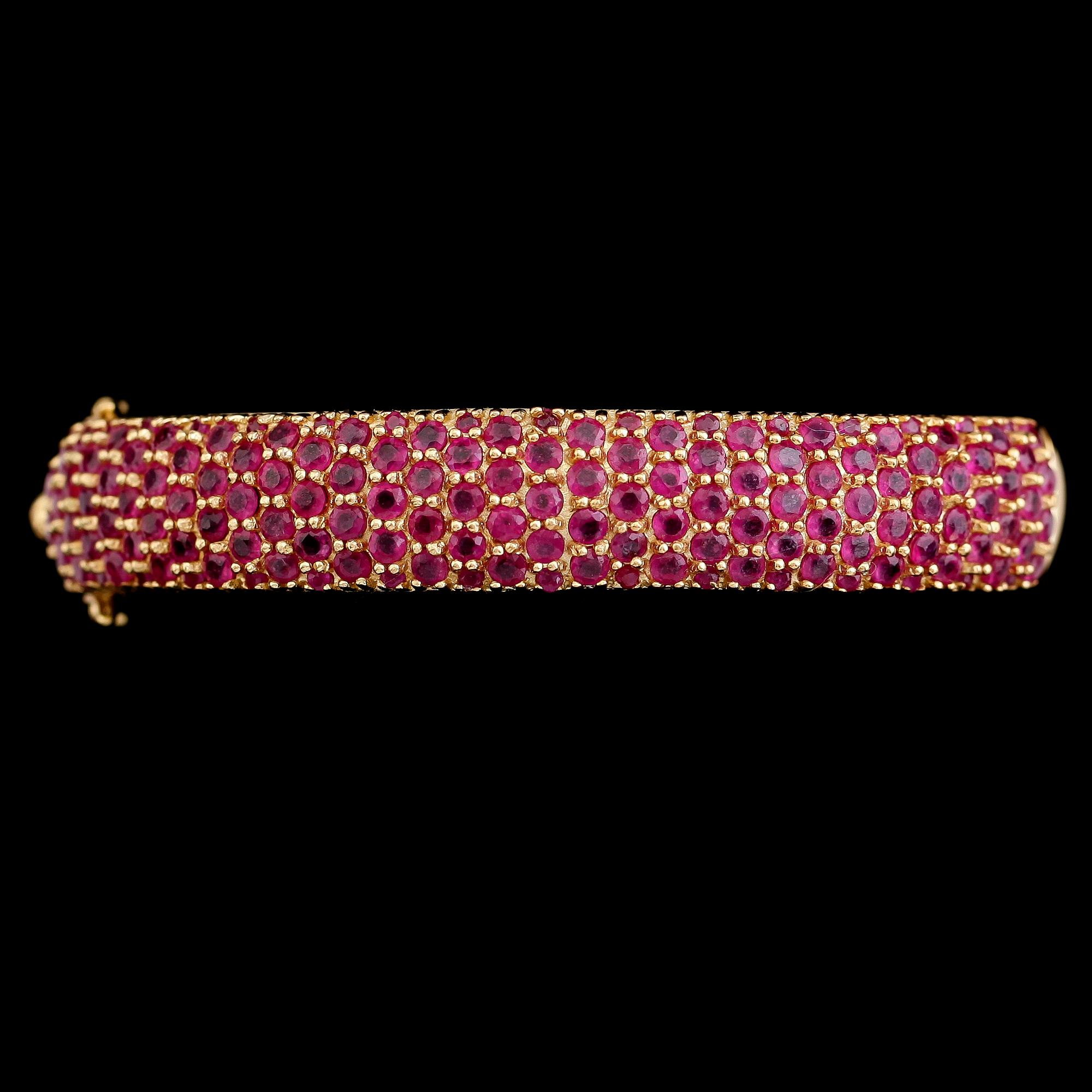 ARMBAND, förgyllt sterlingsilver, rubiner. Vikt ca 35 g.