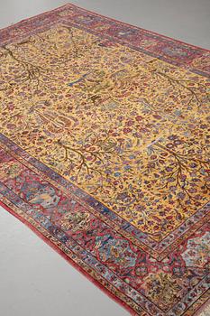 A carpet, a semi-antique silk Kashan figural, ca 309-310 x 204,5-207 cm.