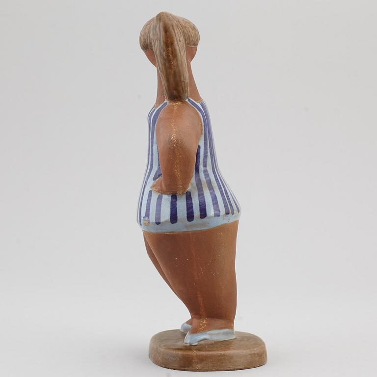 LISA LARSON, a 'Dora' stoneware figurine, from ABC-Flickorna, Gustavsberg.
