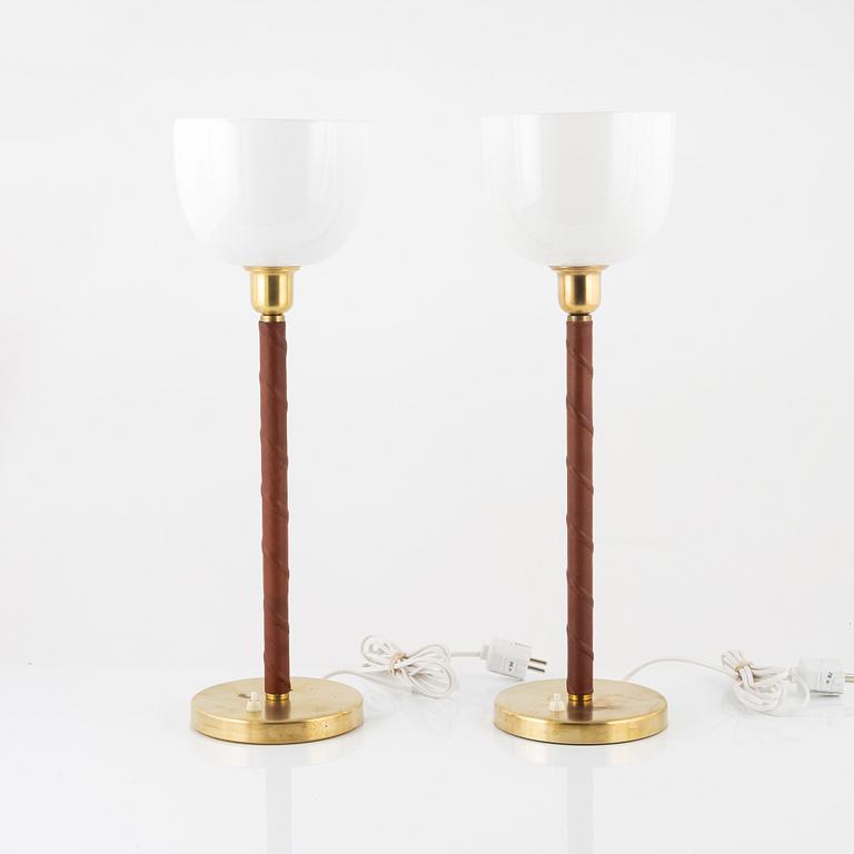 A matched pair of model E 1251 table lamps from ASEA, mid 20th Century.