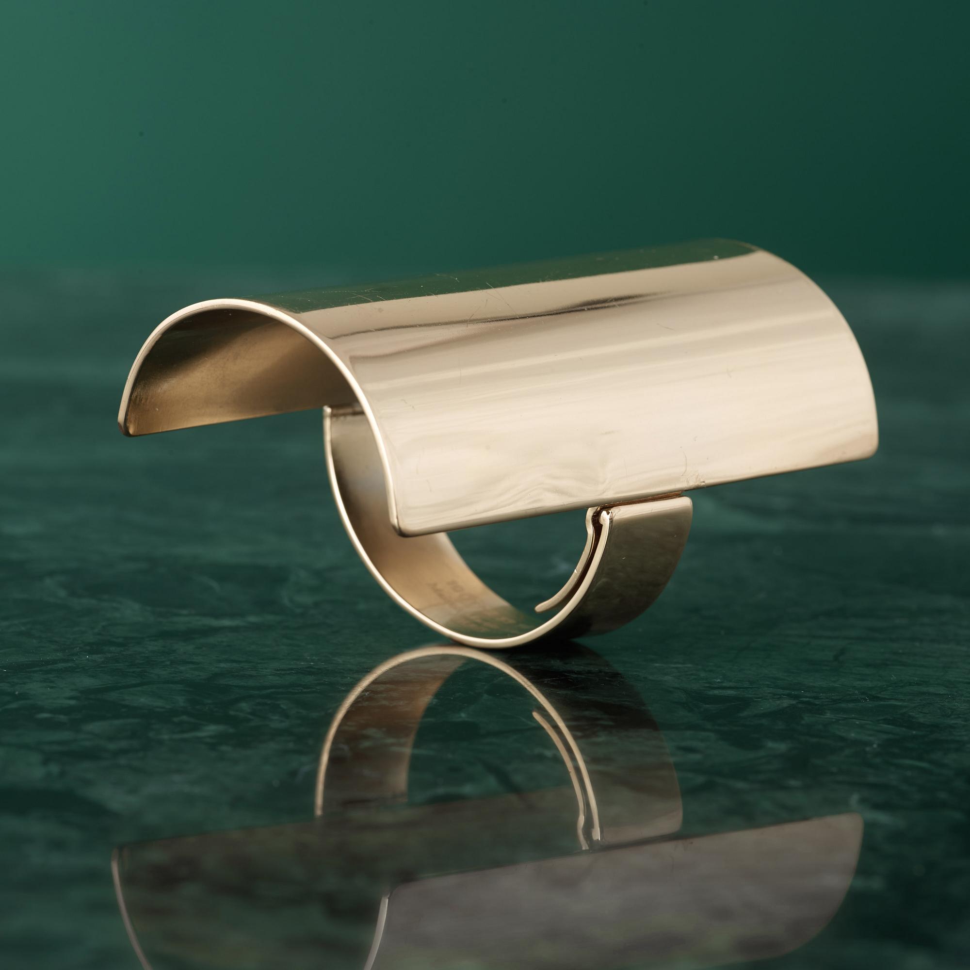 A bracelet by MARTIN MARGIELA.