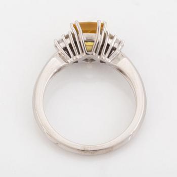 Yellow sapphire and diamond ring.