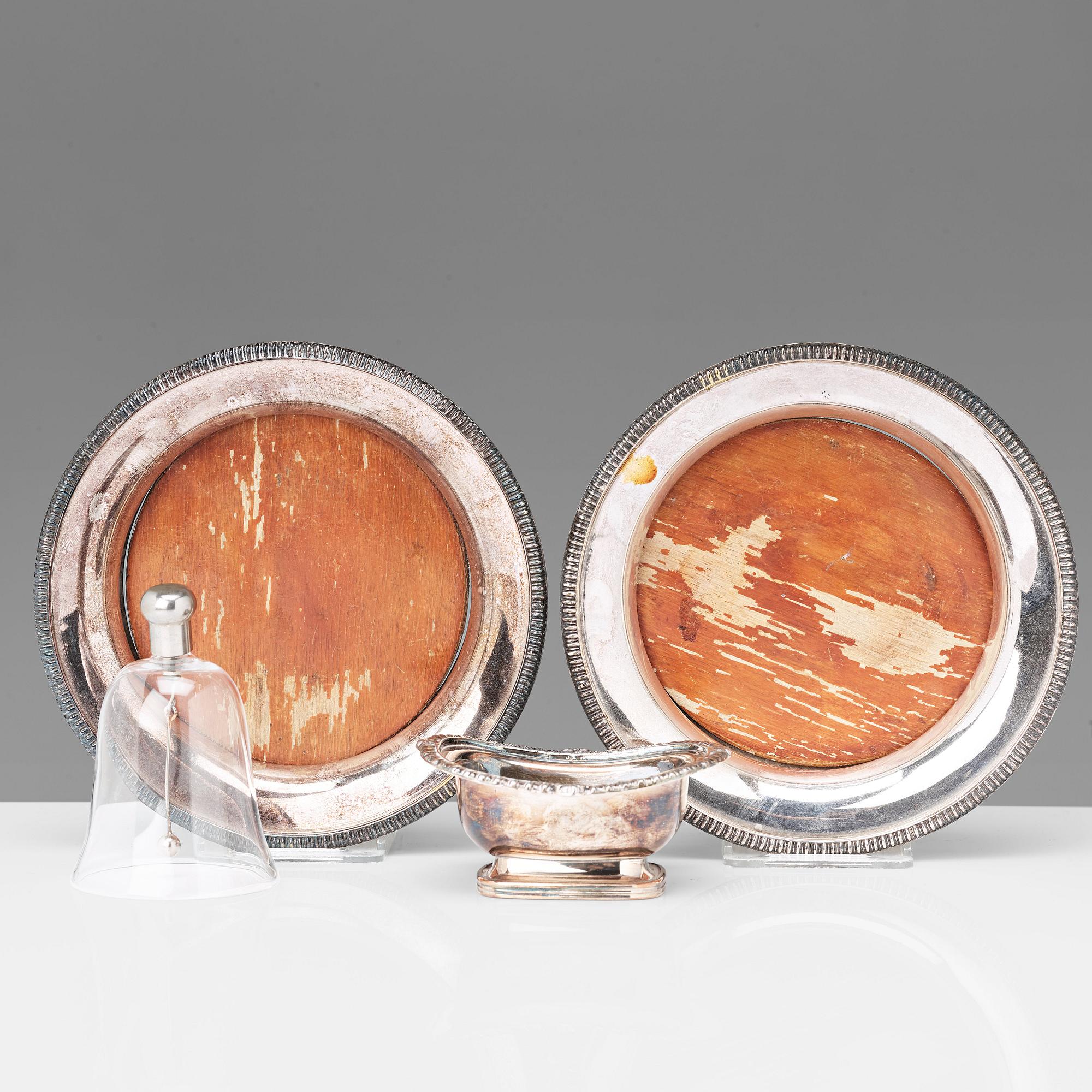 A pair of 20th century coasters, white metal and an English silver plated salt-cellar and A 20th c glass table-bell.