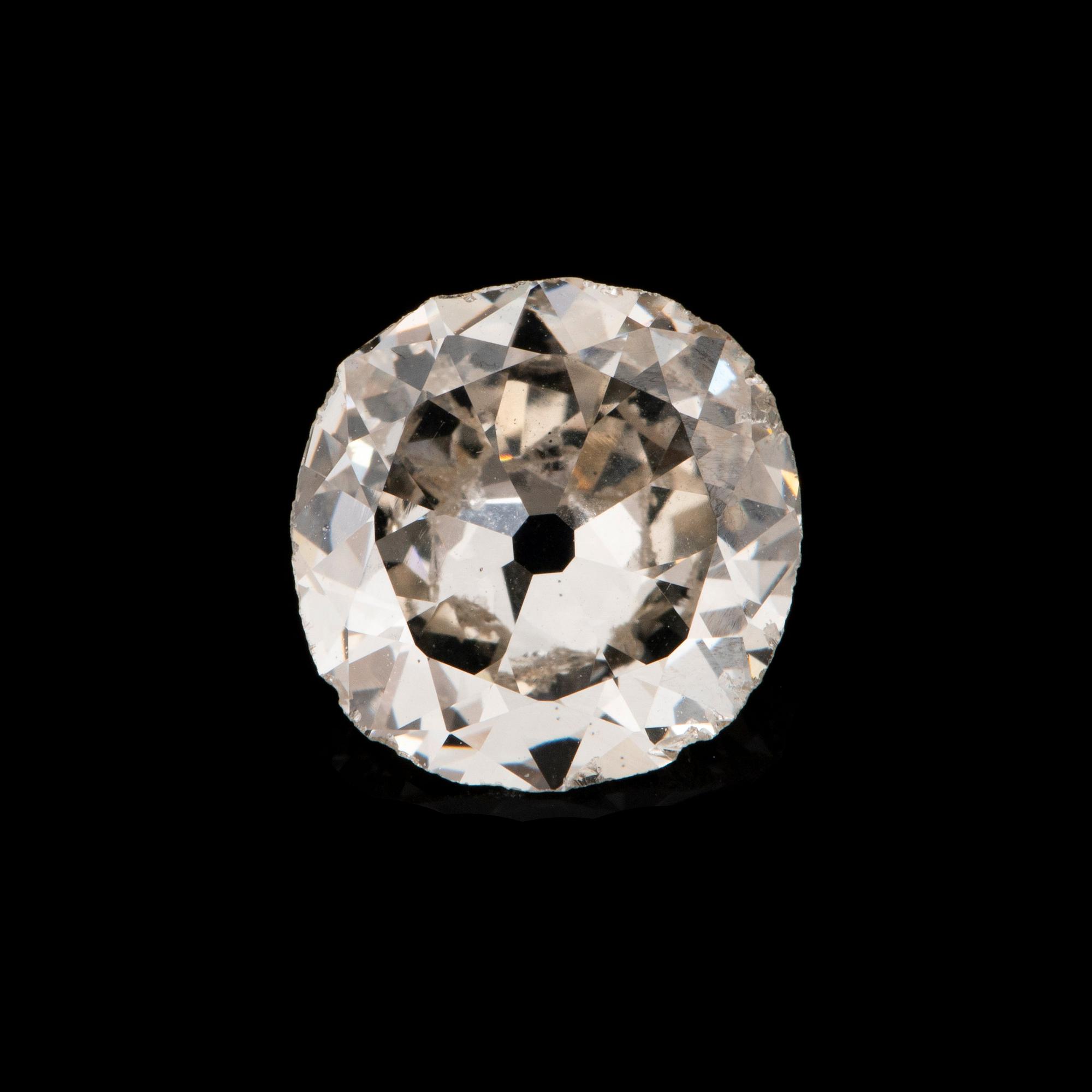 En lös gammalslipad diamant 2.35 ct kvalitet ca L/M i.