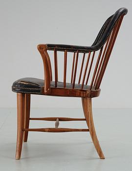 A mahogany and black leather armchair attributed to Josef Frank, either Haus & Garten, Austria or Svenskt Tenn,