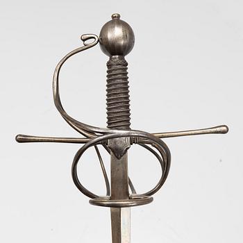 A 17th Century swept hilt rapier.