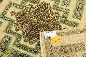 A Moroccan carpet, a. 305 x 196 cm.