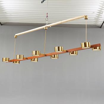 A Hans Agne Jakobsson brass and teak ceiling lamp, Markaryd Sweden 1960-70's.