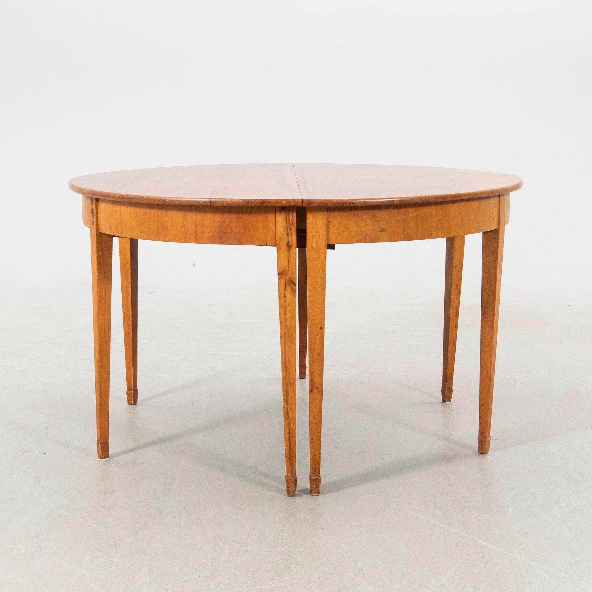 Dining table, turn of the 20th century.