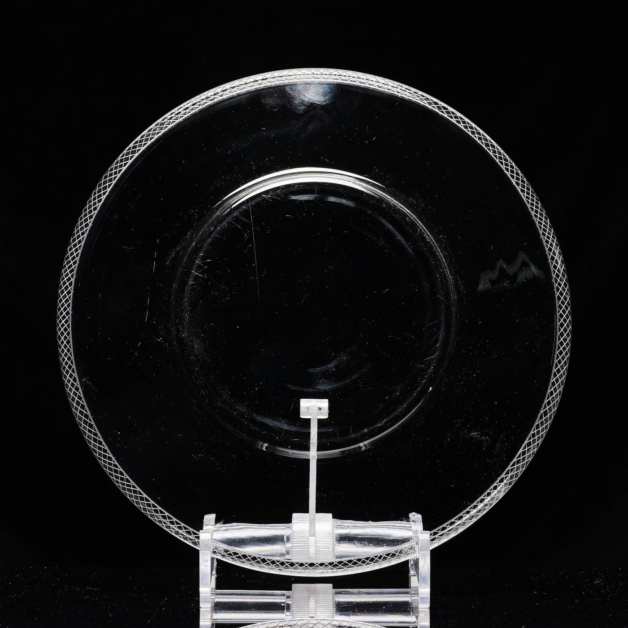 Edward Hald, an engraved glass bowl with plate, Orrefors, Sweden, 1926, model 305, engraved by Emil Goldmann.
