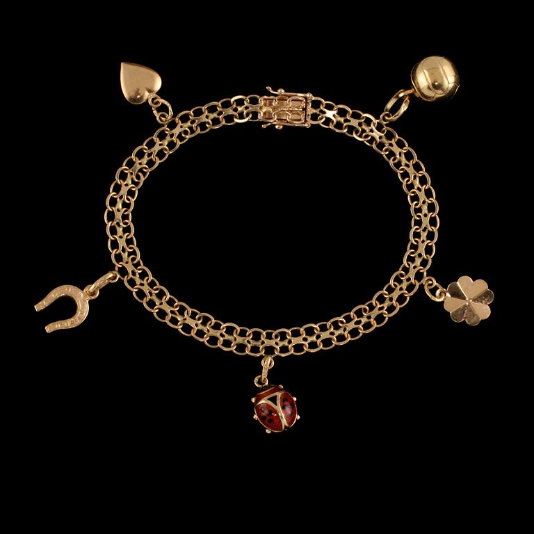 BERLOCKARMBAND, 18k guld samt emalj, Bäckman & Co, Stockholm, 1973. Vikt 9 g.