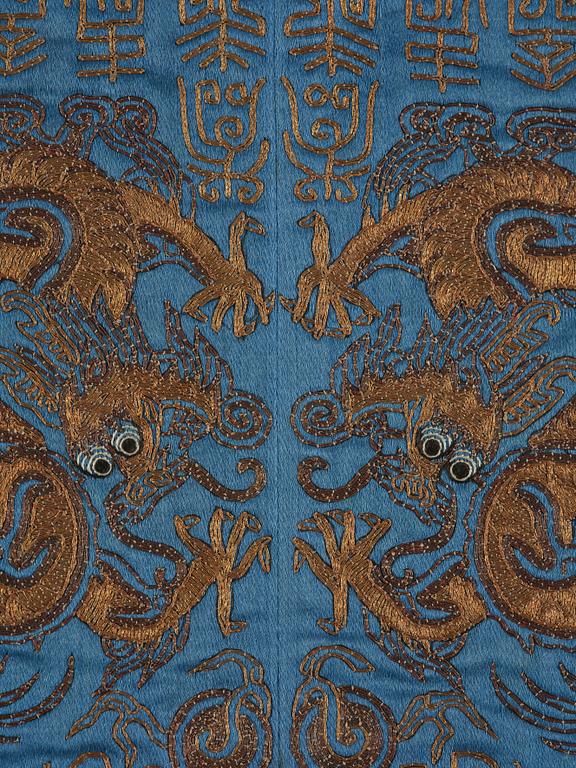 A silk emboridery of dragons, phoenix and shou characters, Qing dynasty, 19th century.