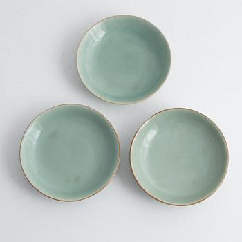 A set of three saucers, around 1900.