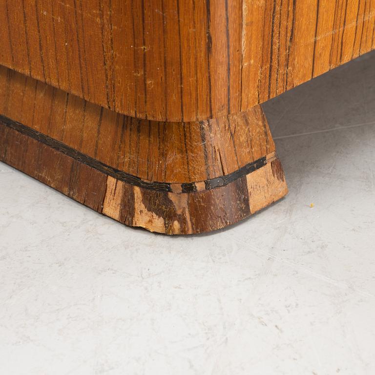 A zebrano veneered Swedish Modern desk, mid 20th Century.