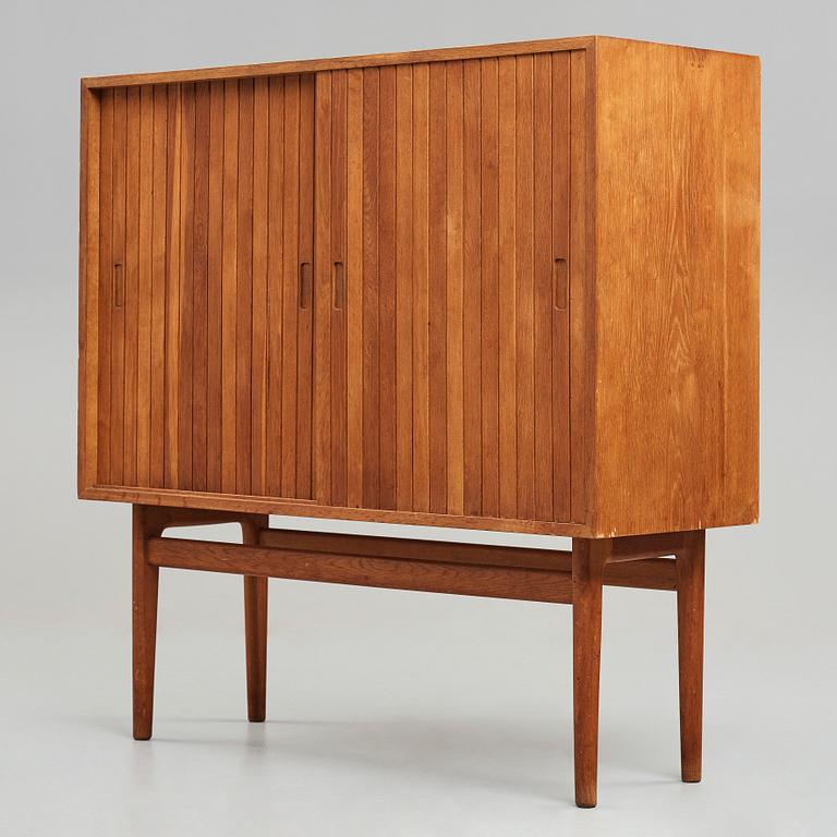 Jørgen Høj, an oak cabinet executed by cabinetmaker Knud Willadsen, Lillerød, Denmark 1952.