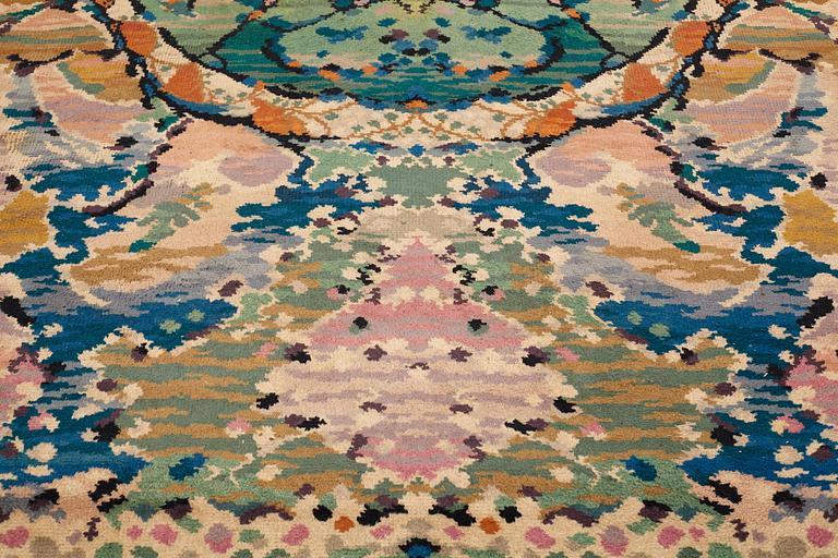 A CARPET, knotted pile, ca 488-491 x 347,5-350,5 cm, probably France, first third of the 20th century.