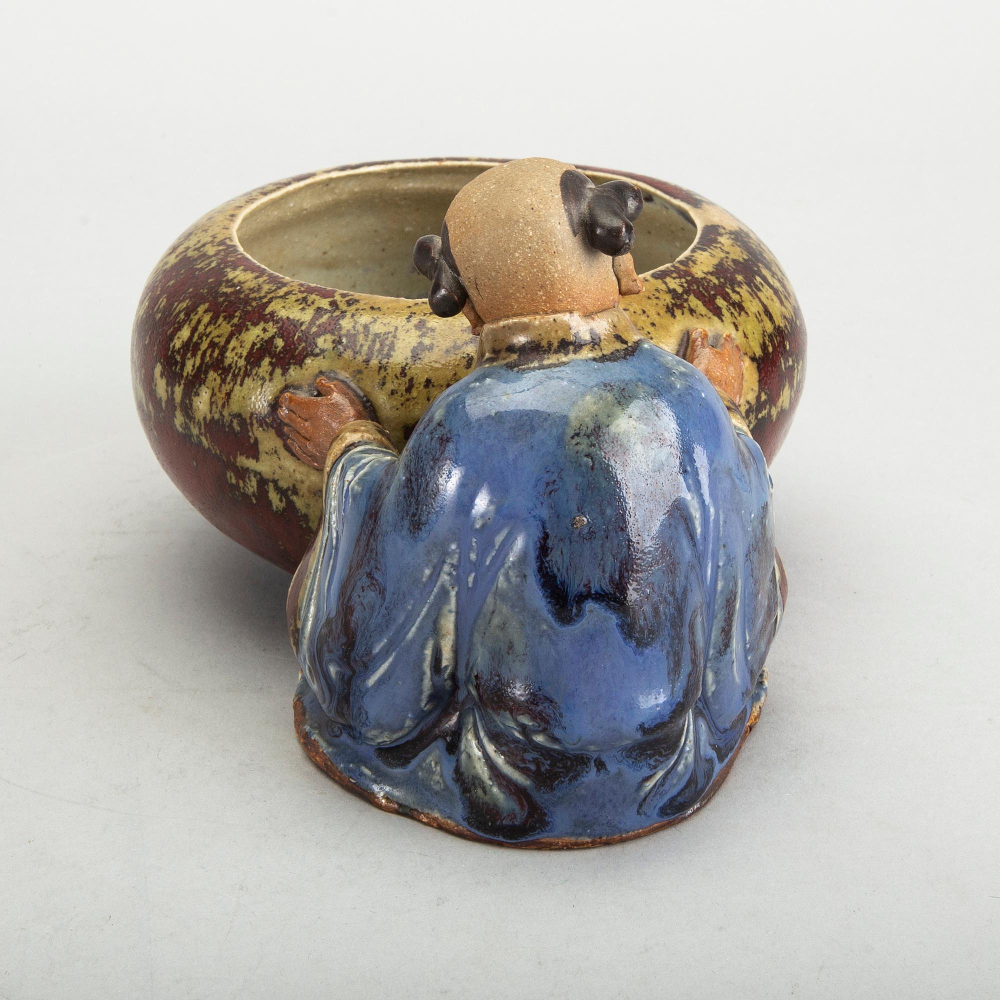 A Japanese 20th century signed porcelain figurine.