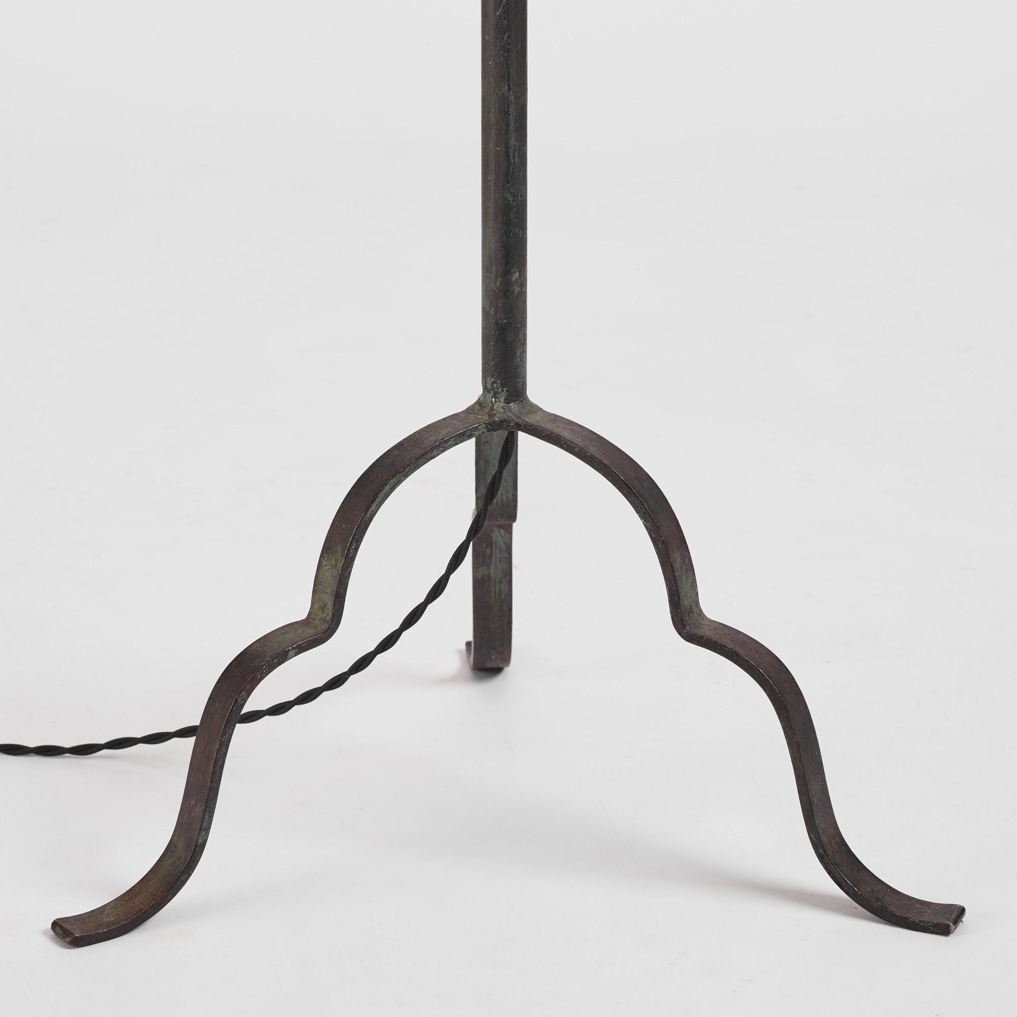 Harald Notini, a pair of wrought iron floor lamps, model "15101", Arvid Böhlmarks Lampfabrik, 1930s.