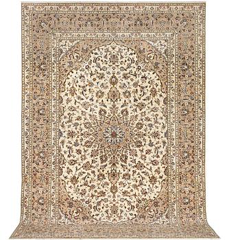 A Keshan carpet, c. 355 x 240 cm.