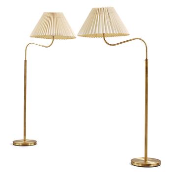 196. Josef Frank, a pair of brass floor lights, Svenskt Tenn, Sweden.