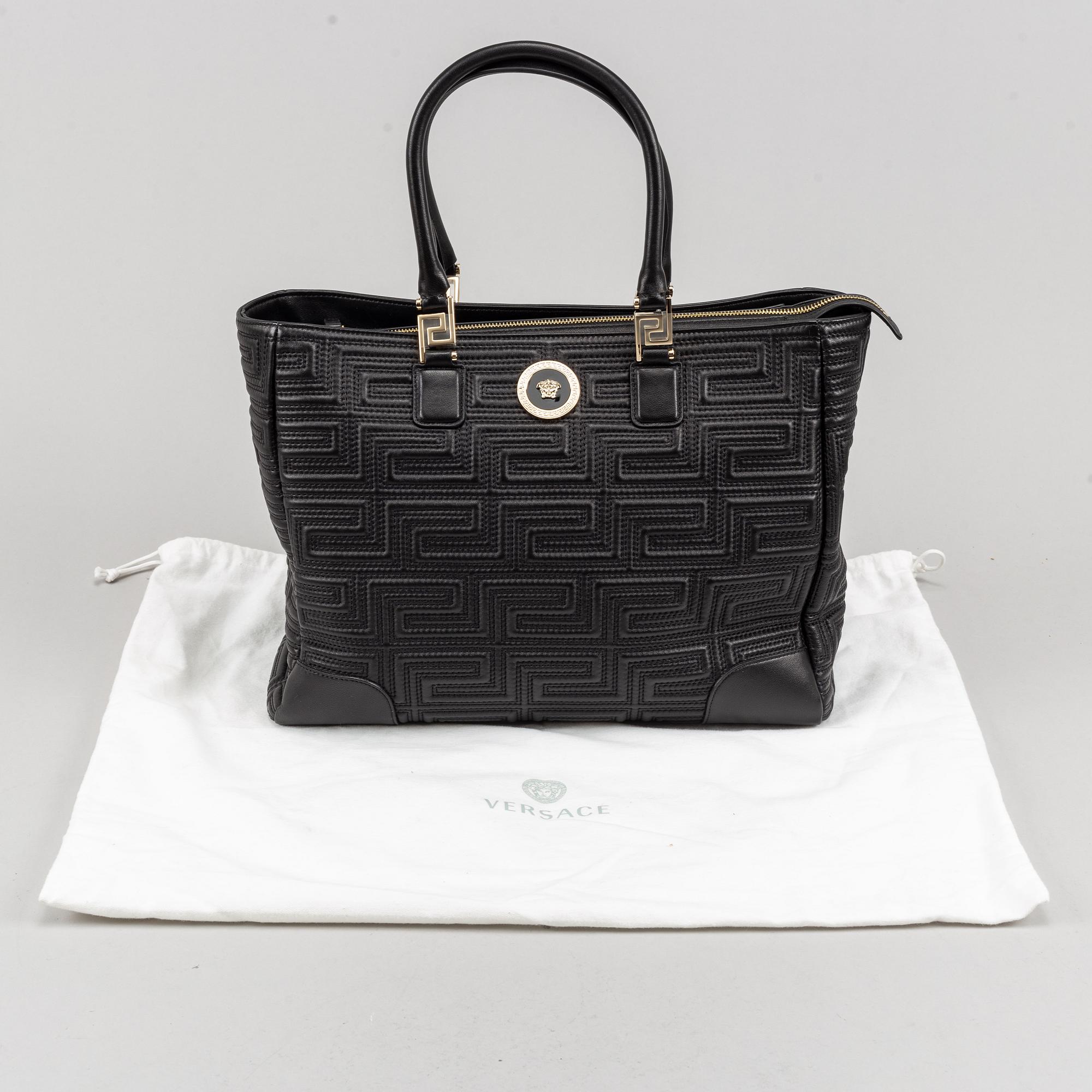 Versace, a black quilted leather handbag.
