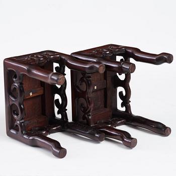 A pair of hardwood pidestals, China, early 20th Century.