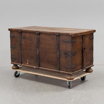 A large 17/17th century baroque oak chest with wrought iron fittings.