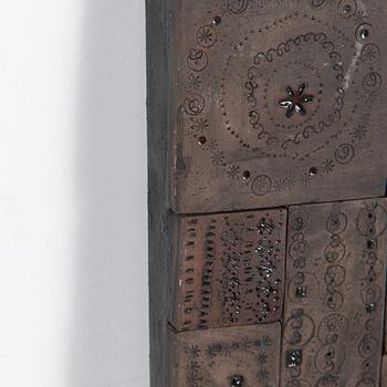 Rut Bryk, relief, signed a tergo.