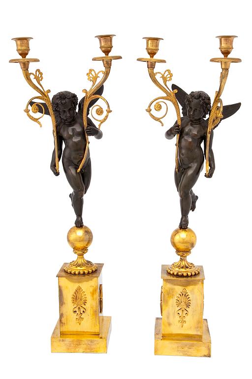 A PAIR OF TWO-LIGHT CANDELABRA.