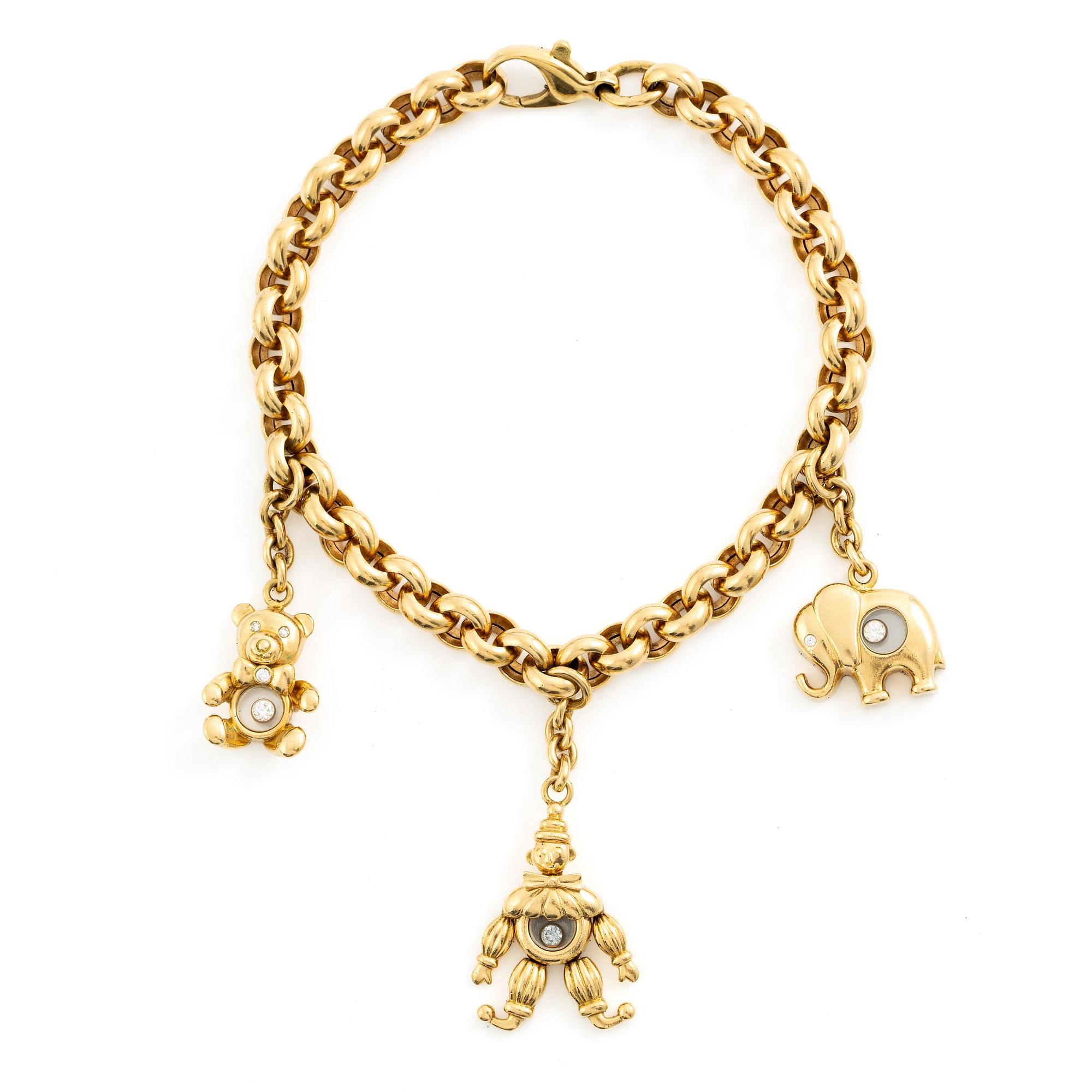 Chopard armband med berlocker 18K guld med runda briljantslipade diamanter.