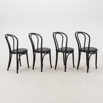 A swt of four painted chairs later part of the 20th century.