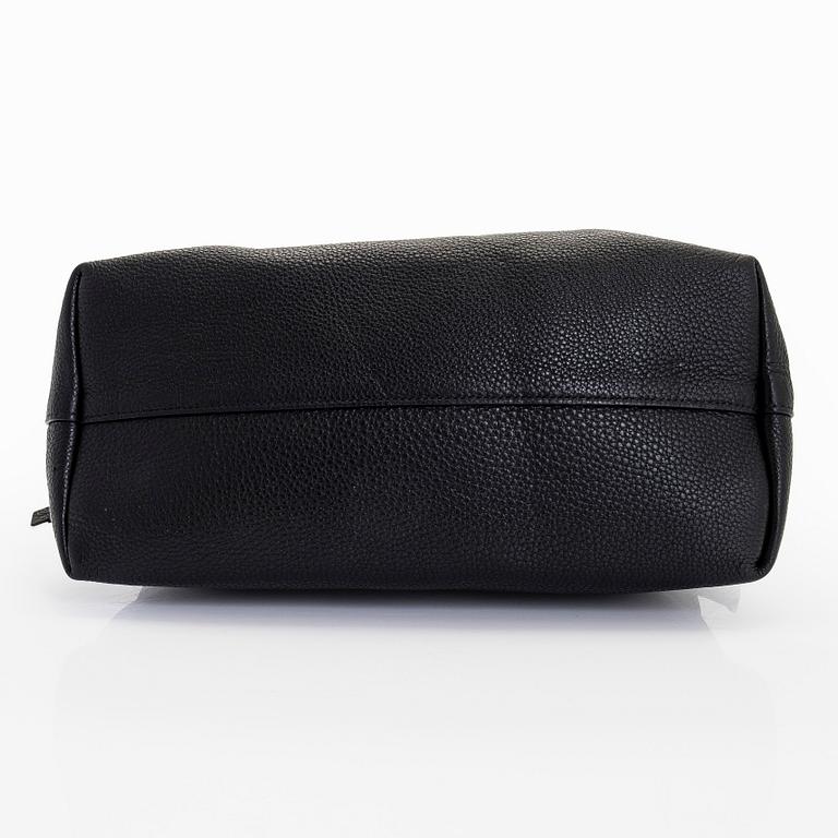 Prada, a leather bag.