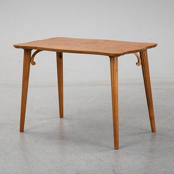 A burr birch veneered Swedish Modern coffee table, 1940's.