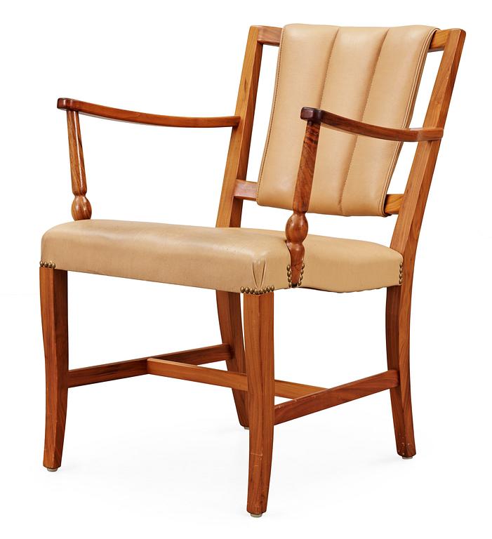 A Josef Frank valnut armchair by Svenskt Tenn.