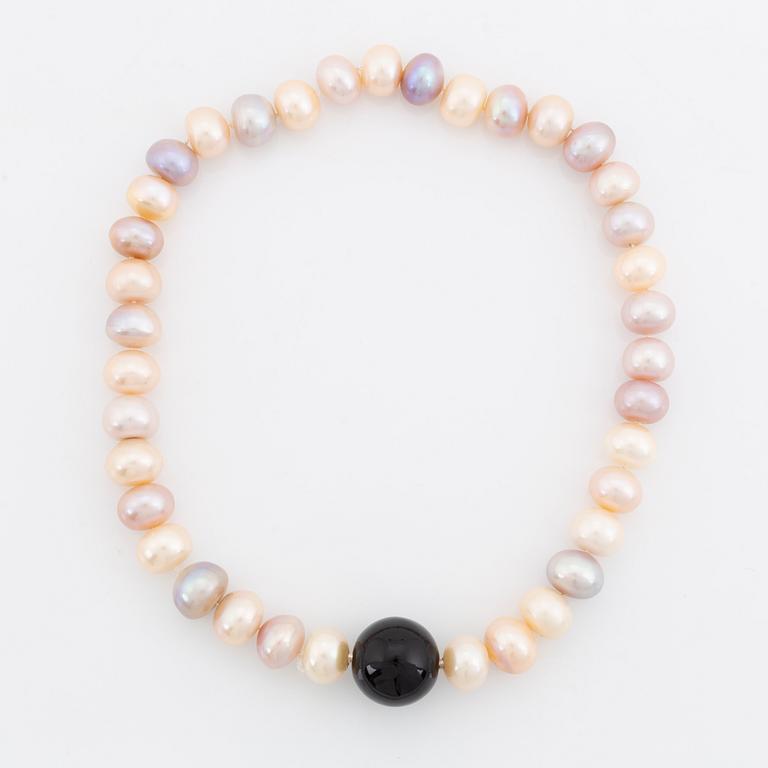 A cultured fresh water pearl necklace.