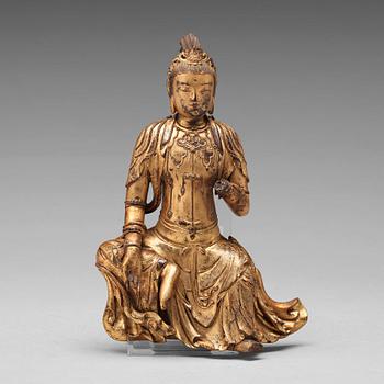 A lacquered wooden figure of Guanyin, 17th/18th Century.