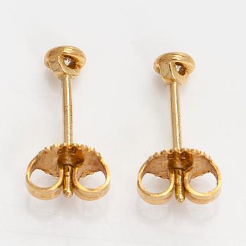 Tiffany & Co, Elsa Peretti, a pair of 18K gold 'Diamonds by The Yard' earrings with brilliant-cut diamonds.